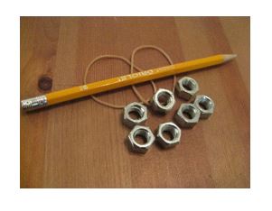 Do-It-Yourself Pencil weight (pencil, hexagon nuts, rubber bands)