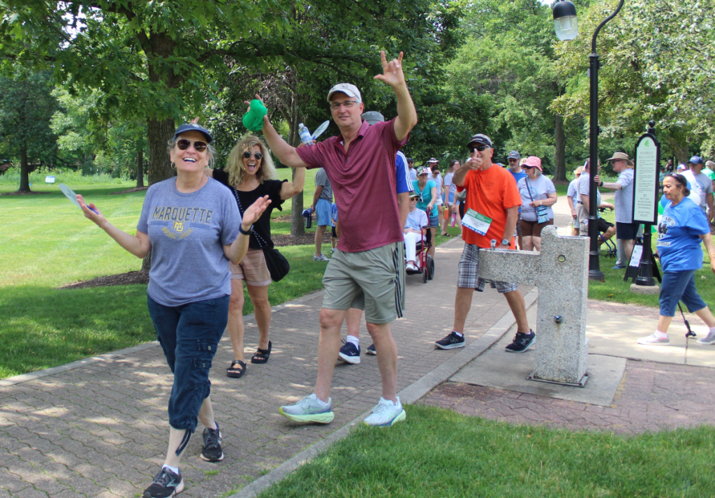 Illinois Optimism Walk participants walking the track