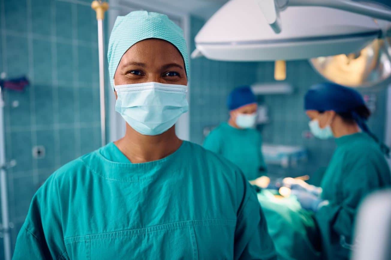 female african american surgeon operating room.jpeg
