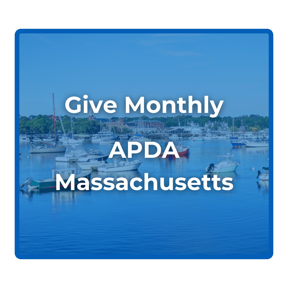 Give Monthly donation button with a photo of a Massachusetts bay