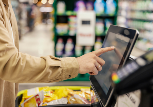 Charity Checkout Campaign - Image of someone checking out at super markert.